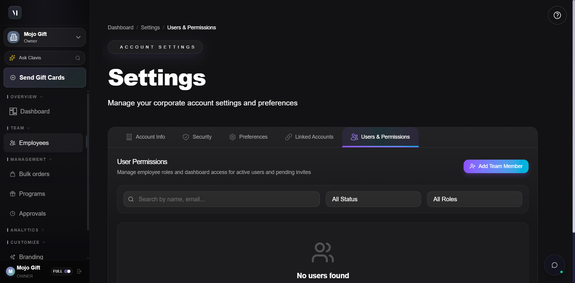 Settings page on the Users & Permissions tab. Header reads Account Settings then Settings, with subtitle Manage your corporate account settings and preferences. Tab row shows Account Info, Security, Preferences, Linked Accounts, Users & Permissions (active). Below the tabs, a panel titled User Permissions with subtitle Manage employee roles and dashboard access for active users and pending invites, an Add Team Member button on the right, a search input, an All Status dropdown, an All Roles dropdown, and an empty state reading No users found, No users available.