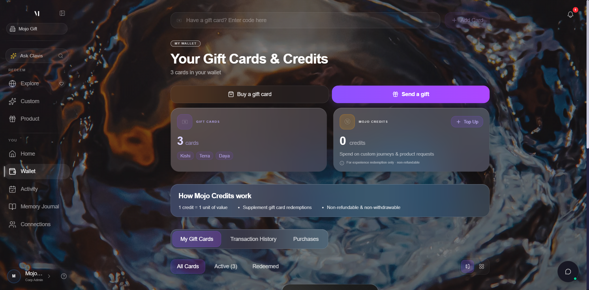 Wallet view scrolled to show three gift cards in a carousel. The centre card is an EXORA tier card with a dark cover, From R Famorca, May 4, 2026, with caption Tap to view details. To the right, a LUNARA tier card and a TERRA tier card titled Celebrating Your Journey are partially visible. Below the carousel, three quick links: Curated Experiences, Request a Product, Custom Experience.